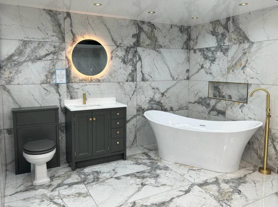 Bathroom - marble display with bath, toilet and vanity unit