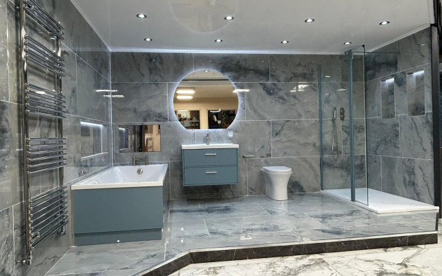 Bathroom with large spacious tiles and floating cabinet